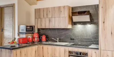 Cuisine ou kitchenette dans l'établissement Résidence Le Grand Bouquetin - 3 Pièces pour 8 Personnes MAE-9944