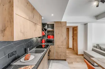 Cuisine ou kitchenette dans l'établissement Résidence Le Grand Bouquetin - 2 Pièces pour 6 Personnes MAE-0024