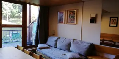 Coin salon dans l'établissement Résidence Aiguille Grive Bat Iii - Appartement 3 pièces 8 personnes en duplex, skis aux pieds, dans le village de Charmettoger à Arc 1800 MAE-2171