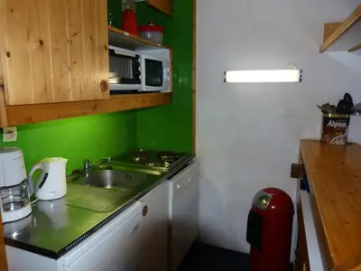 Cuisine ou kitchenette dans l'établissement Résidence Aiguille Grive Bat Iii - Appartement 3 pièces 8 personnes en duplex, skis aux pieds, dans le village de Charmettoger à Arc 1800 MAE-2171