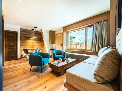 Coin salon dans l'établissement Appartement rénové 2 pièces cabine proche pistes avec WIFI - FR-1-502-463