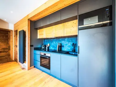 Cuisine ou kitchenette dans l'établissement Appartement rénové 2 pièces cabine proche pistes avec WIFI - FR-1-502-463