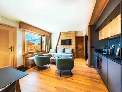 Coin salon dans l'établissement Appartement rénové 2 pièces cabine proche pistes avec WIFI - FR-1-502-463
