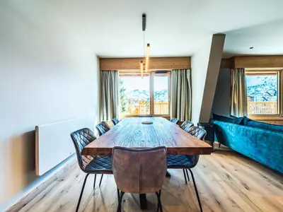 Coin salon dans l'établissement 4 pièces rénové avec WIFI · Proche pistes · 8 couchages - FR-1-502-462