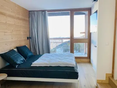 Un ou plusieurs lits dans un hébergement de l'établissement Appartement rénové 3 pièces, balcon, WIFI, 6/7 pers, Les Arcs 2000 - FR-1-346-529