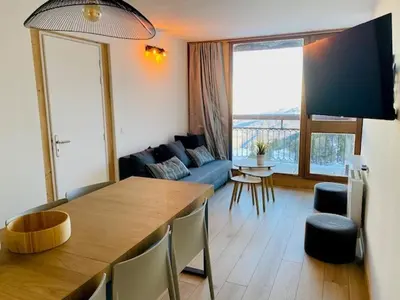Coin salon dans l'établissement Appartement rénové 3 pièces, balcon, WIFI, 6/7 pers, Les Arcs 2000 - FR-1-346-529