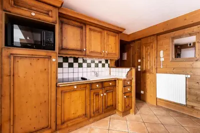 Cuisine ou kitchenette dans l'établissement Résidence Les Alpages de Chantel - maeva Home - Appartement 4 pièces 8 personnes - Sélection MAE-4004