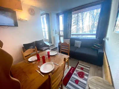 Coin salon dans l'établissement Appartement cosy, proche centre, balcon, vue Mont Blanc - FR-1-346-483