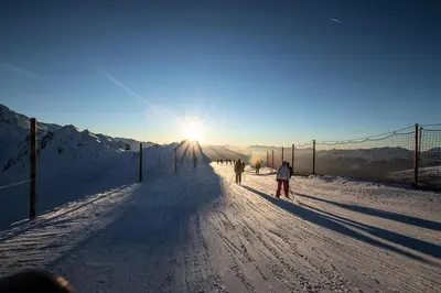 L'établissement Résidence Aiguille Grive Bat I - Duplex pour 5 personnes à Arc 1800 dans le village de Charmettoger, skis aux pieds MAE-1768 en hiver