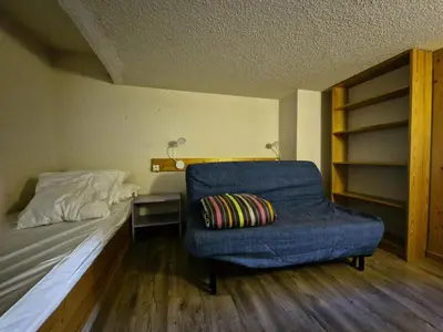 Coin salon dans l'établissement Résidence Aiguille Grive Bat I - Duplex pour 5 personnes à Arc 1800 dans le village de Charmettoger, skis aux pieds MAE-1768