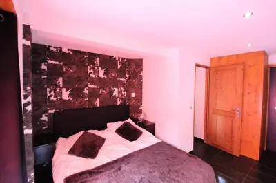 Un ou plusieurs lits dans un hébergement de l'établissement Chalet Des Domaines De La Vanoise - Confortable appartement au calme, à 1km du village et 5 km de la station MAE-3134