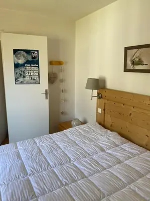 Un ou plusieurs lits dans un hébergement de l'établissement Cosy F2 Val Claret 6 couchages avec jolie vue sud ouest