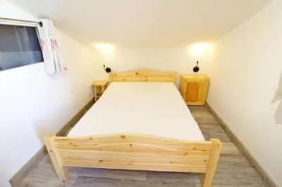 Un ou plusieurs lits dans un hébergement de l'établissement Le Hameau De Borsat - Situation privilègiée appartement proche piste MAE-1244