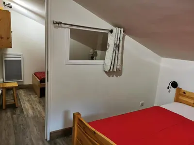 Un ou plusieurs lits dans un hébergement de l'établissement Le Hameau De Borsat - Situation privilègiée appartement proche piste MAE-1244