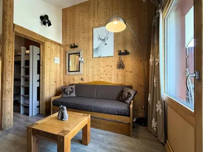 Coin salon dans l'établissement Le Hameau De Borsat - Appartement tout confort au pied des pistes MAE-1264
