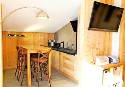Cuisine ou kitchenette dans l'établissement Le Hameau De Borsat - Appartement tout confort au pied des pistes MAE-1264