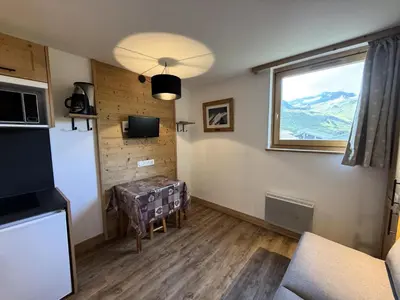 Cuisine ou kitchenette dans l'établissement Les Tommeuses - Charmant studio au pied des pistes MAE-1394