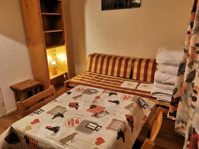 Un ou plusieurs lits dans un hébergement de l'établissement Les Tommeuses - Studio idéalement placé au pied des pistes MAE-1424