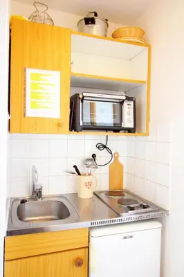 Cuisine ou kitchenette dans l'établissement Rond Point Des Pistes - studio fonctionnel au pied des pistes MAE-1434