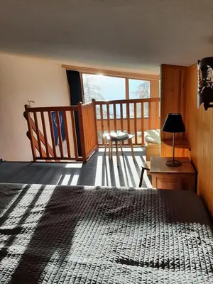 Un ou plusieurs lits dans un hébergement de l'établissement RESIDENCE LE RUITOR Duplex dernier étage vue panoramique classé 4 Cristaux Paradiski Piscine privée chauffée en ETE