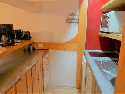 Cuisine ou kitchenette dans l'établissement Studio jusqu'à 4 pers à Arc 2000, animaux admis - FR-1-411-855