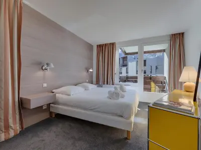Un ou plusieurs lits dans un hébergement de l'établissement Appartement ski familial au cœur de Val Claret avec Wifi - FR-1-641-12