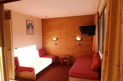 Télévision ou salle de divertissement dans l'établissement Résidence Corail - Studio divisible fonctionnel · Centre station · Vue vallée · Balcon MAE-1044