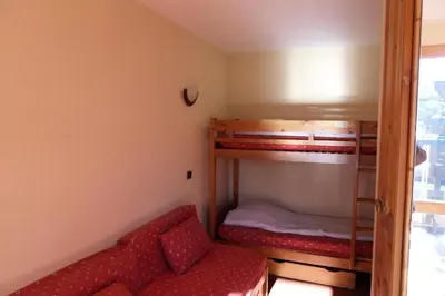 Un ou plusieurs lits dans un hébergement de l'établissement Résidence Corail - Studio divisible fonctionnel · Centre station · Vue vallée · Balcon MAE-1044