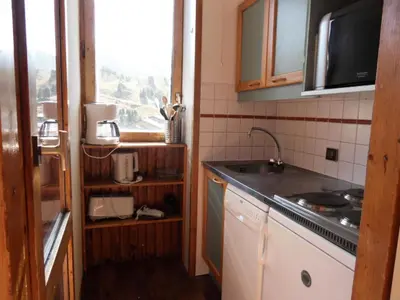 Cuisine ou kitchenette dans l'établissement Résidence Corail - Studio divisible fonctionnel · Centre station · Vue vallée · Balcon MAE-1044