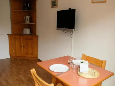 Télévision ou salle de divertissement dans l'établissement Chalet Club Iii - Appartement proche des pistes et commerces·Balcon MAE-3584