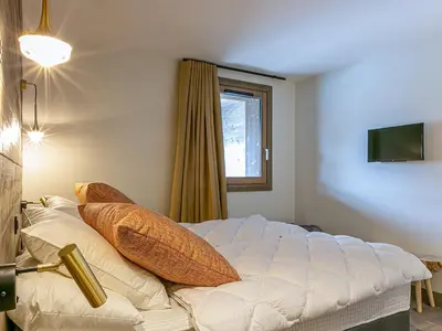 Un ou plusieurs lits dans un hébergement de l'établissement Appartement haut standing, 5 pièces pour 8 pers., proche du centre, lumineux, Val-d'Isère - FR-1-694-4