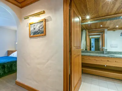 Un ou plusieurs lits dans un hébergement de l'établissement Bel appartement de standing au coeur de Val-d'Isère, accès direct aux pistes - FR-1-694-31