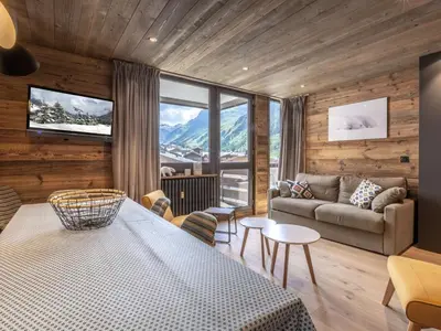 Coin salon dans l'établissement Superbe 3 pièces au centre de Val-d'Isère, haut standing, Wi-Fi, 2 salles d'eau, proche commodités - FR-1-694-34