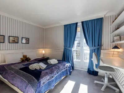 Un ou plusieurs lits dans un hébergement de l'établissement Appartement de standing avec cheminée, 4 chambres, garage et WIFI, Val-d'Isère - FR-1-694-25