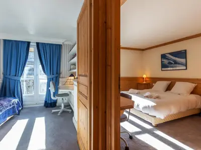 Un ou plusieurs lits dans un hébergement de l'établissement Appartement de standing avec cheminée, 4 chambres, garage et WIFI, Val-d'Isère - FR-1-694-25