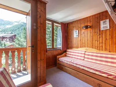 Un ou plusieurs lits dans un hébergement de l'établissement Duplex cosy à Val-d'Isère avec wifi et parking, animaux admis - FR-1-694-39