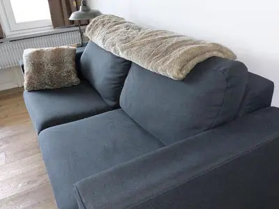 Coin salon dans l'établissement Appartement cosy avec wifi, au cœur de Val-d'Isère, proche des pistes et des commodités - FR-1-694-42