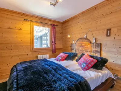 Un ou plusieurs lits dans un hébergement de l'établissement Appartement de standing avec sauna au cœur de Val-d'Isère - FR-1-694-48