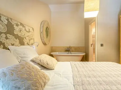Un ou plusieurs lits dans un hébergement de l'établissement Duplex élégant à Val-d'Isère : Wifi, parking couvert, proche commodités et navette - FR-1-694-61