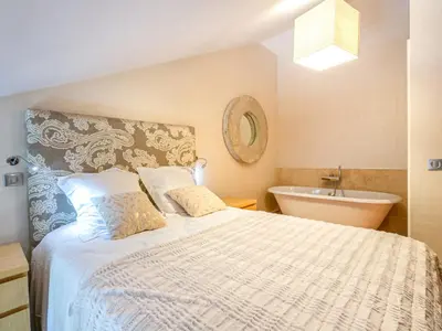 Un ou plusieurs lits dans un hébergement de l'établissement Duplex élégant à Val-d'Isère : Wifi, parking couvert, proche commodités et navette - FR-1-694-61