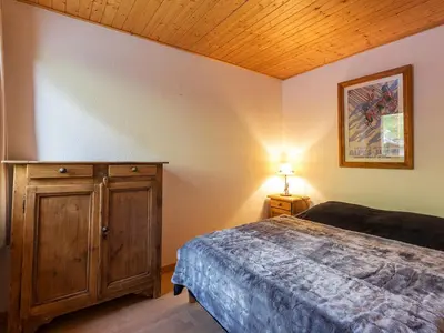 Un ou plusieurs lits dans un hébergement de l'établissement Duplex skis aux pieds avec balcon et wifi à Val-d'Isère - FR-1-694-53