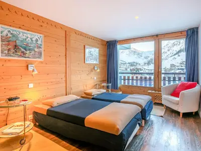 Un ou plusieurs lits dans un hébergement de l'établissement Appartement moderne avec WiFi et lave-linge au coeur de la station - FR-1-694-47