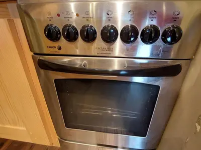 Cuisine ou kitchenette dans l'établissement Appartement moderne avec WiFi et lave-linge au coeur de la station - FR-1-694-47