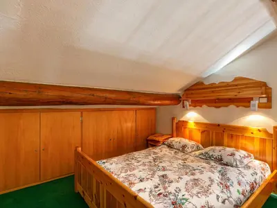Un ou plusieurs lits dans un hébergement de l'établissement Appartement duplex 5 pers. avec wifi et parking à Val-d'Isère - FR-1-694-68