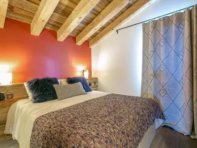 Un ou plusieurs lits dans un hébergement de l'établissement Luxueux appartement sous charpente proche des pistes - 10 pers - FR-1-694-90