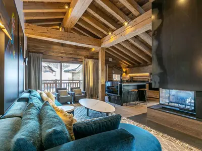 Coin salon dans l'établissement Luxueux appartement sous charpente proche des pistes - 10 pers - FR-1-694-90