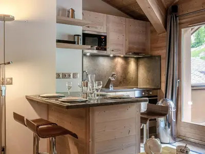 Cuisine ou kitchenette dans l'établissement Studio de standing avec balcon au cœur du village, proche pistes et commodités - FR-1-694-85