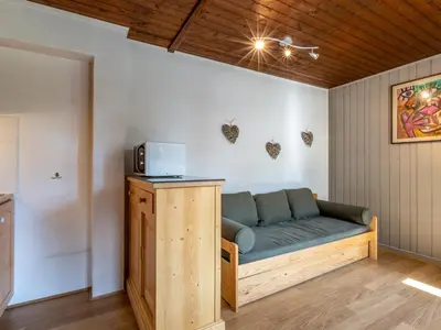 Coin salon dans l'établissement Studio chaleureux au cœur de Val-d'Isère, animaux acceptés - FR-1-694-110