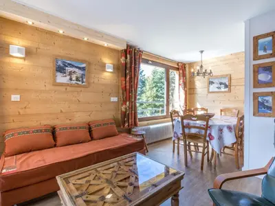 Coin salon dans l'établissement Appartement intime et confortable avec balcon sud à Val-d'Isère - FR-1-694-115