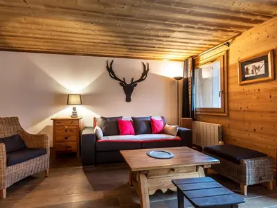 Coin salon dans l'établissement Appartement haut de gamme au centre, animaux admis, WiFi - FR-1-694-107